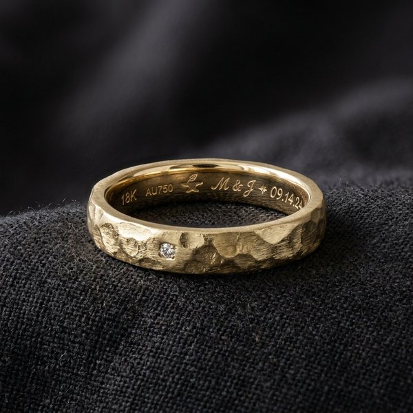 Hand-hammered solid gold band by Vrai